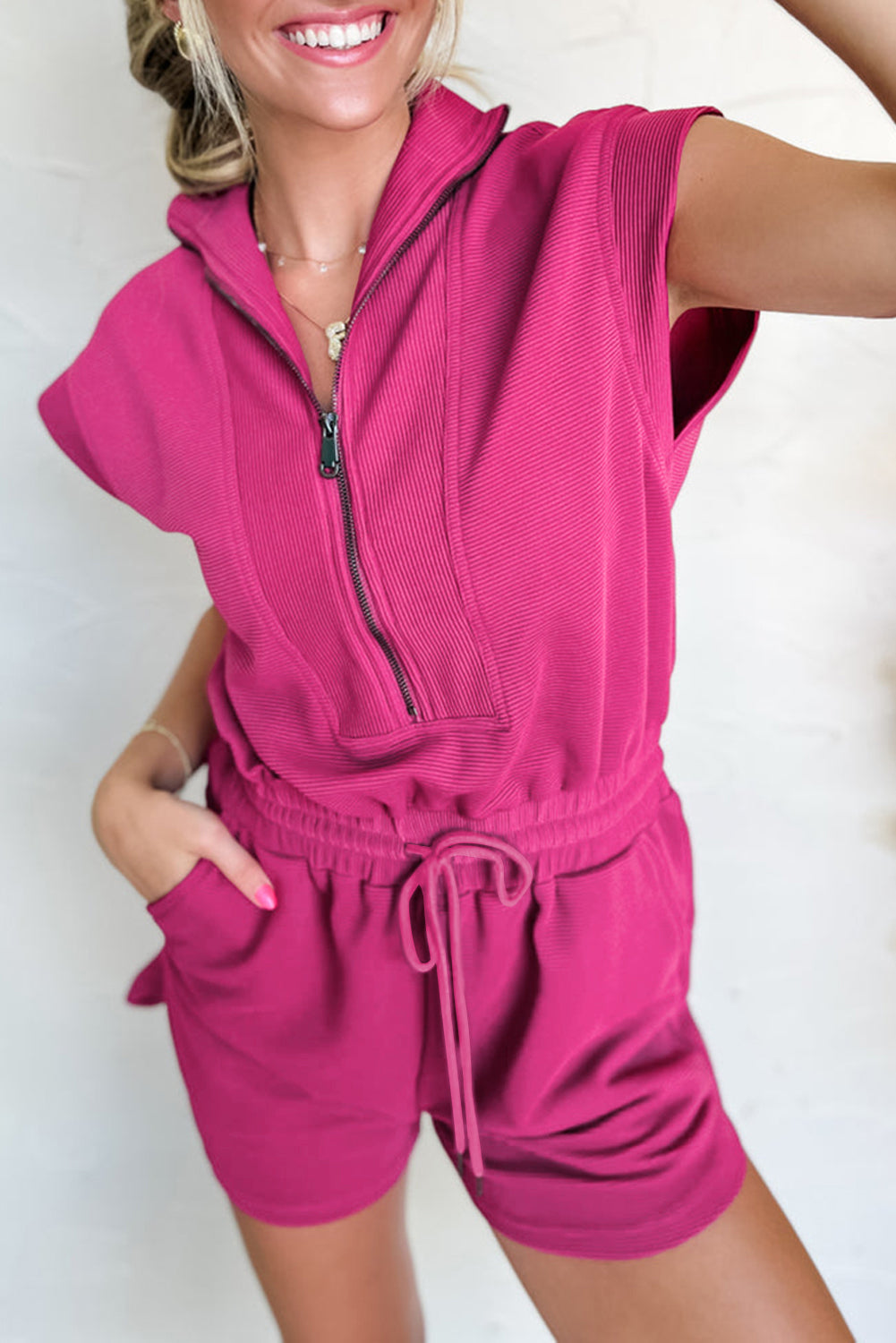 Bright Green Textured Short Sleeve Half Zip Drawstring Waist Romper