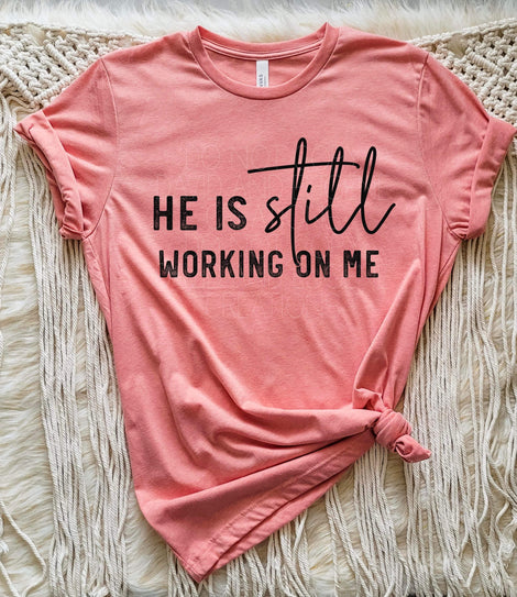 He is still working on me graphic tee